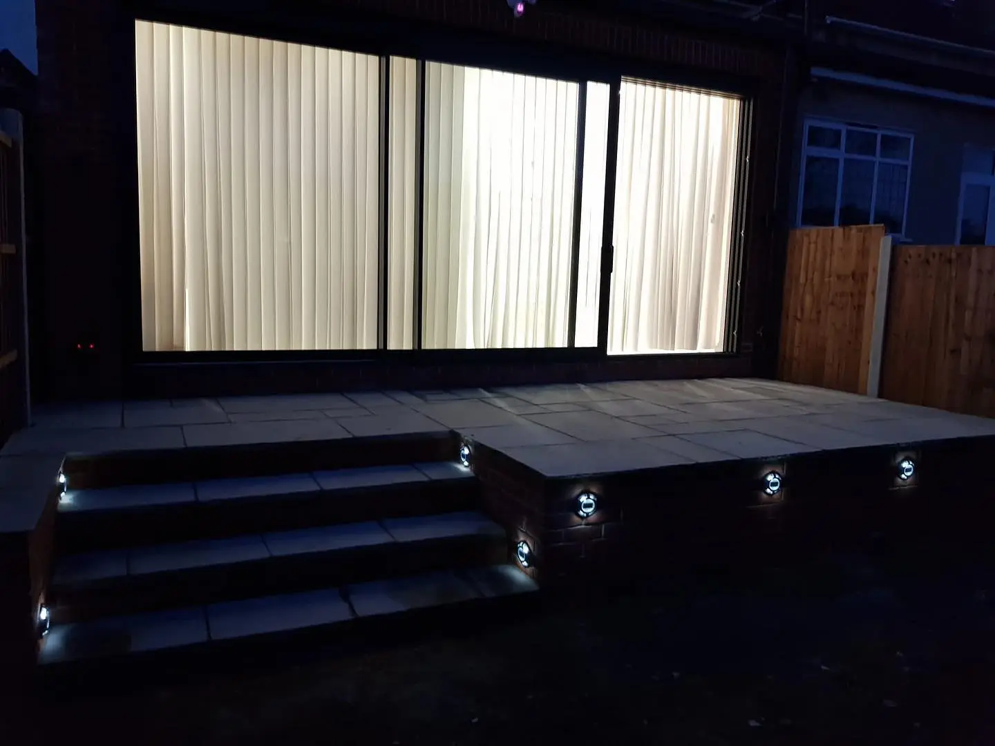 Night rear garden patio stairs lights in Ilford London